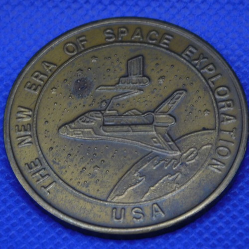 Commemorative metal token with space shuttle, USA