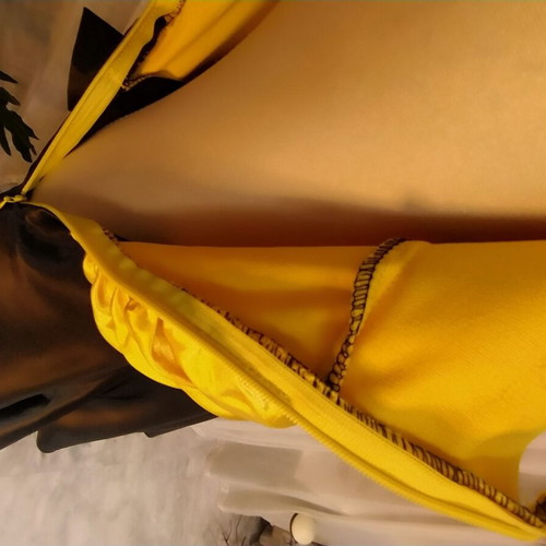Evening dress like new with black sequins and yellow fabric