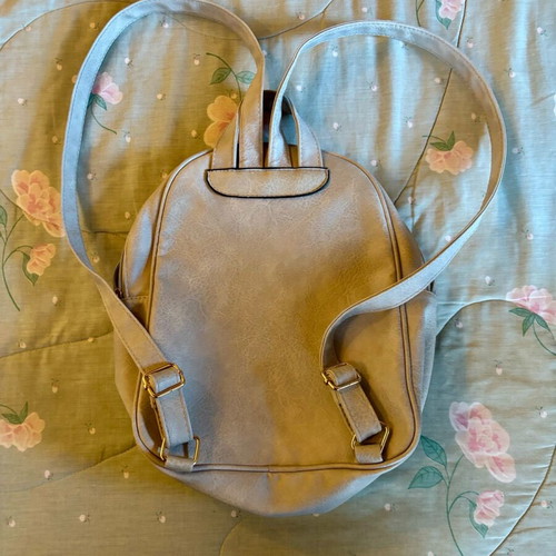 Women's backpack used in light gray color