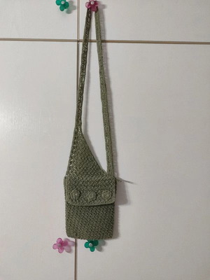 Knitted khaki hanging bag like new, very elegant