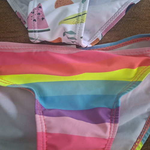 Swimwear bottoms for girls age 8 like new, pack of 2, colorful