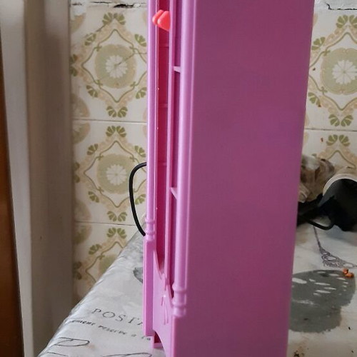 Doll wardrobe used pink with 2 hangers
