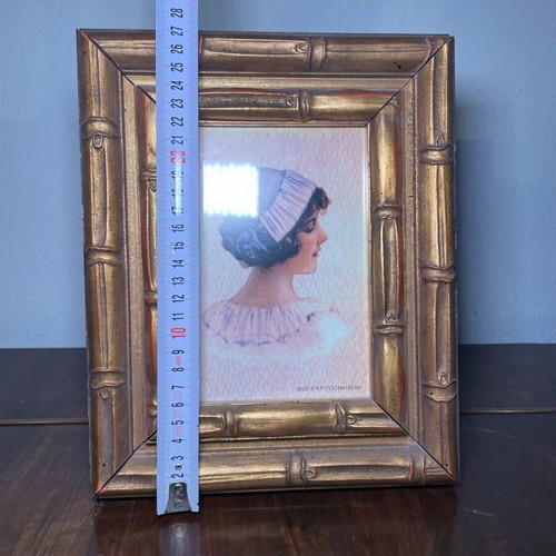 Golden frame used, wooden carved