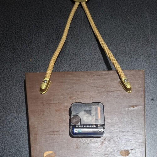 Mid-Century Modern wall clock like new with rope and wood