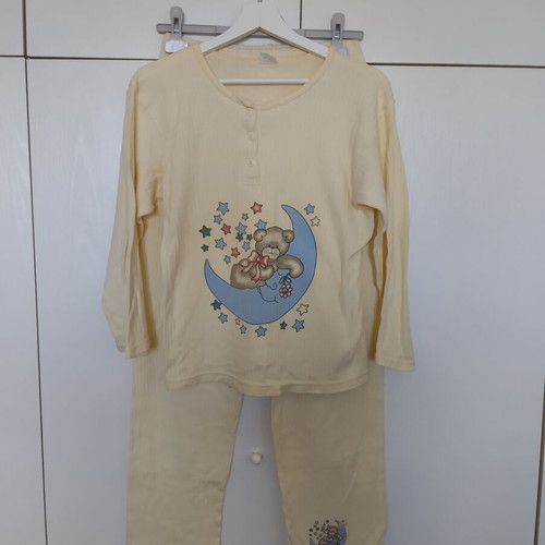Girls' pajamas used yellow with teddy bear