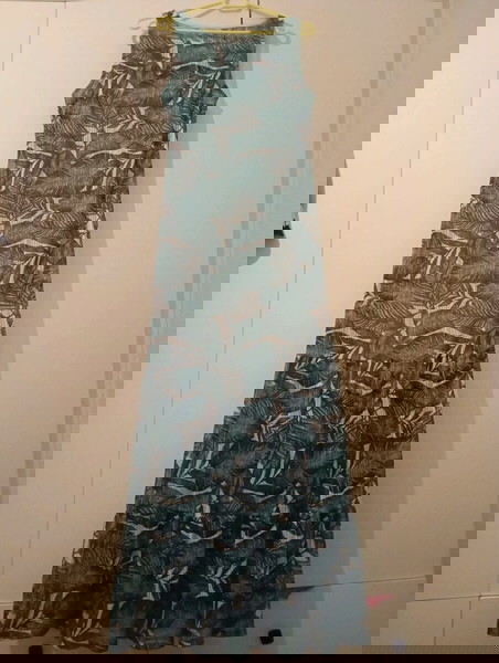 Guess maxi φόρεμα με μεσοφορι κατάλληλο για medium large σε άριστη κατασταση πολύ εντυπωσιακό