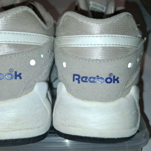 Reebok athletic shoes with reflective details, like new
