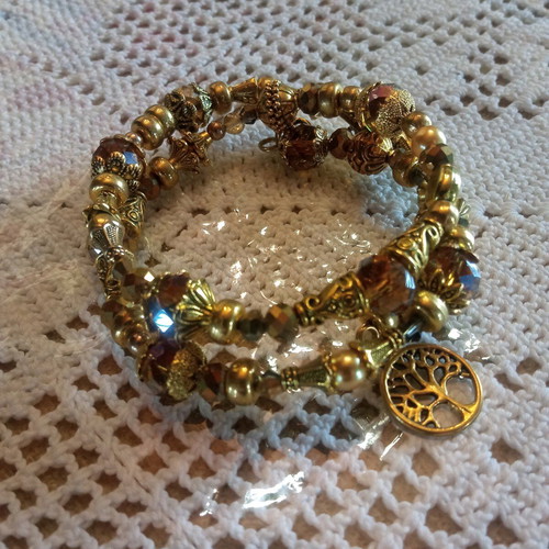 Handmade bracelet new in golden tones