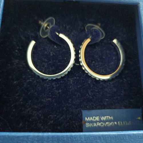 Swarovski earrings new, silver color