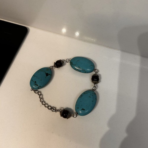 Summer bracelet with blue stones and black beads