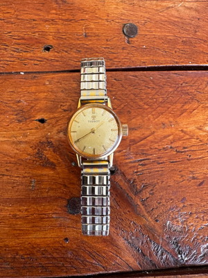 Tissot women's watch used, gold color