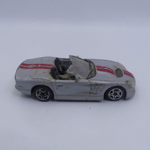 Ford Shelby Series 1 Burago Street Fire 1/43 used, silver with red stripes