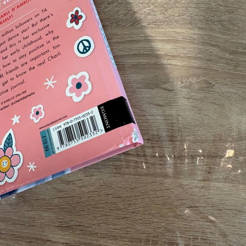 Charli D'Amelio Essentially Charli hardcover used, English