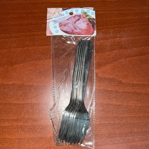 Set of stainless steel forks with decorative handle