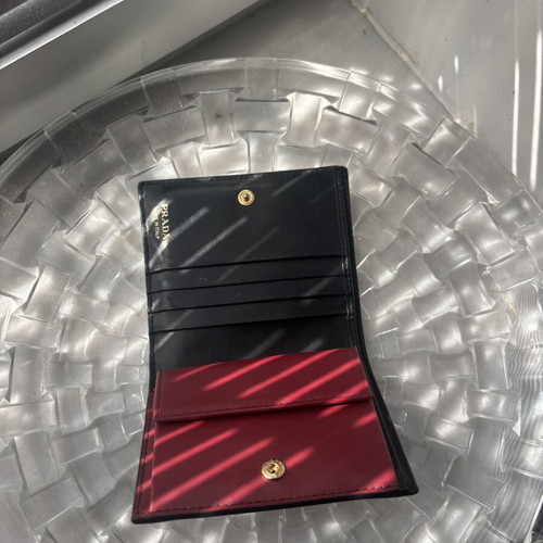 Prada wallet used, black and red