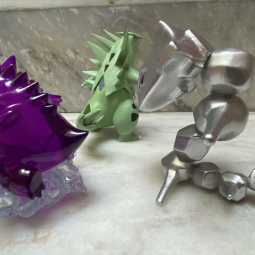 Pokemon figures pack used with Tyranitar, Gengar, Steelix