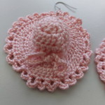 Handmade crochet earrings in pink, like new, hat shape