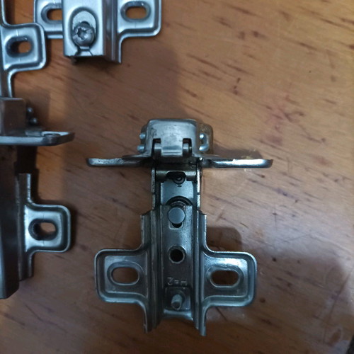 Cabinet hinges used, set of 7 pieces