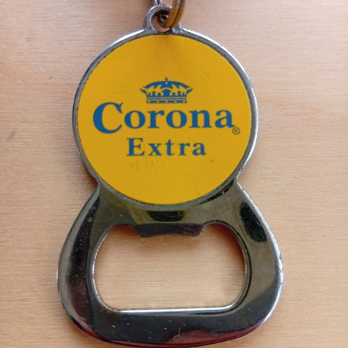 Corona Extra keychain bottle opener used with retractable strap