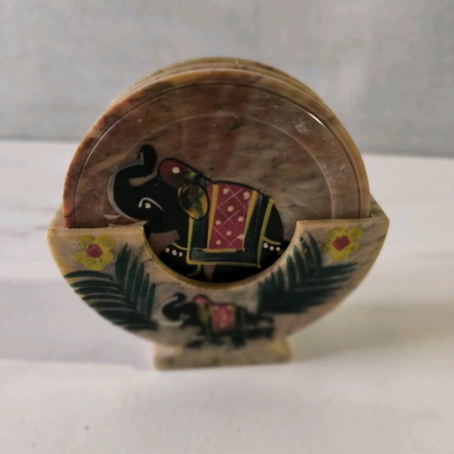 Marble coasters used with elephant painting from India