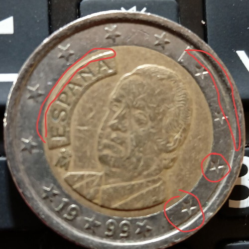 Spanish 2€ coin used 1999 with collectible error
