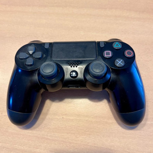 PS4 Slim 500GB console with 2 DualShock 4 controllers and Chimparty game