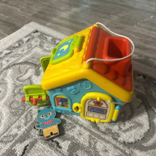 Educational Mobility Toy like new with wooden cat