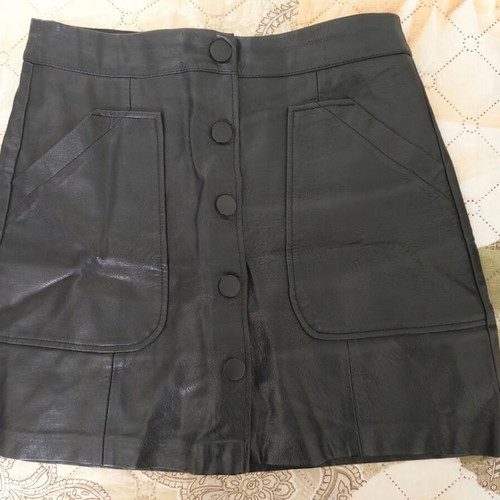 Skirt made of synthetic leather like new, black