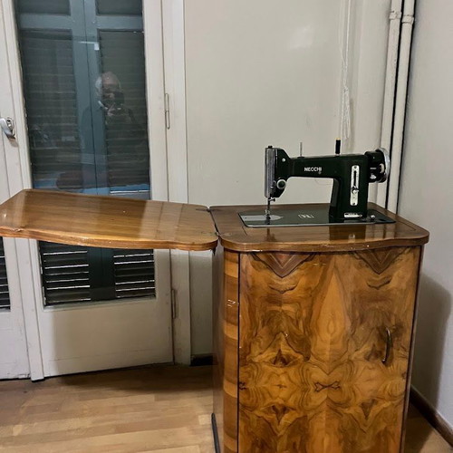 Necchi sewing machine used with antique cabinet, fully functional