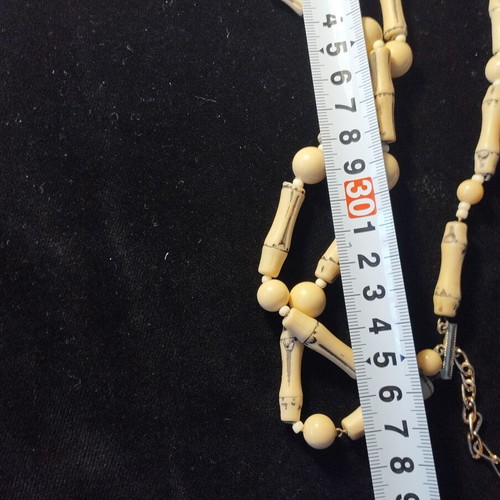 Beige necklace used