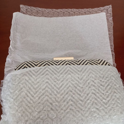 Clutch bag with hard frame, new, black and gold chevron pattern
