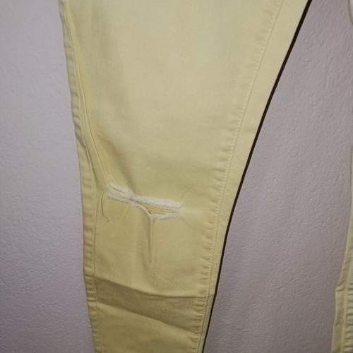 Stradivarius pastel yellow skinny jeans like new, distressed style