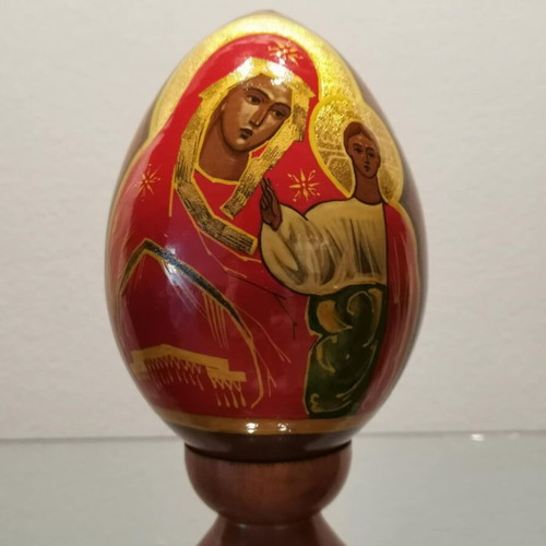 Russian egg used with hand-painted decoration and wooden base