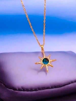 Steel necklace new with blue stone and gold details