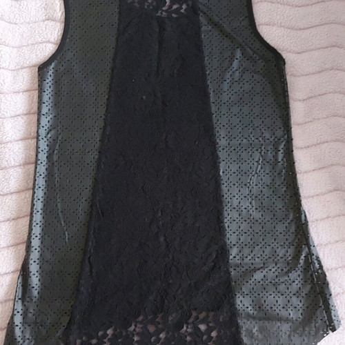 Sleeveless black top with leatherette and lace like new