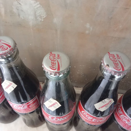 Collectible Coca Cola bottle full from 1990s decade new, one piece