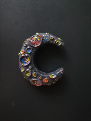 Handmade magnet from white cement with acrylics and varnish