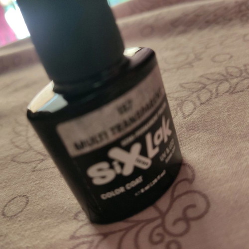 Semi-permanent nail polishes new, gel hardener and silver base with rhinestones