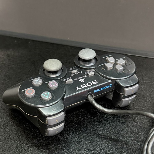 PlayStation 2 Controller A used, genuine Sony, fully functional
