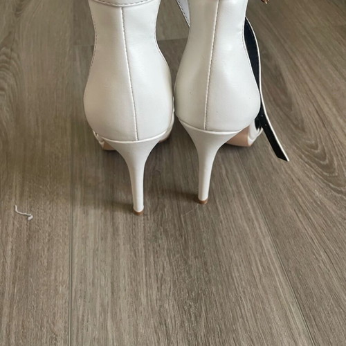White sandals used with ankle strap and 12 cm heel size 40