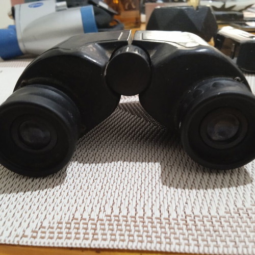 Binoculars with central focus adjustment used