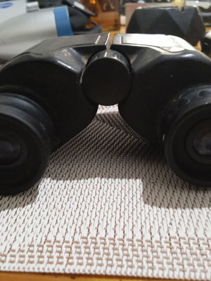 Binoculars with central focus adjustment used