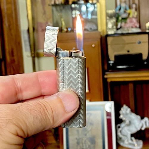 Cartier lighter used silver collectible with herringbone pattern