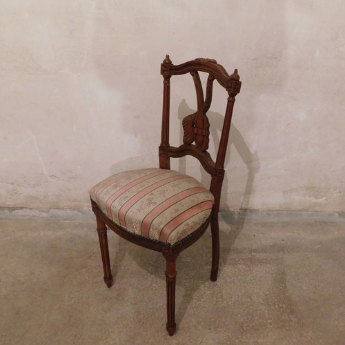 Pair of carved wooden chairs with striped fabric seat like new