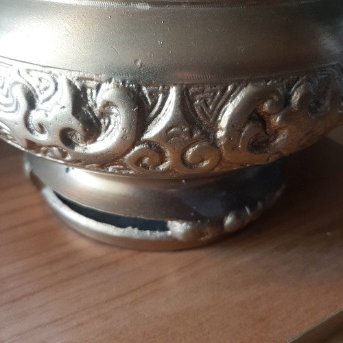 Vintage metal vessel with wooden base used, decorative aroma container