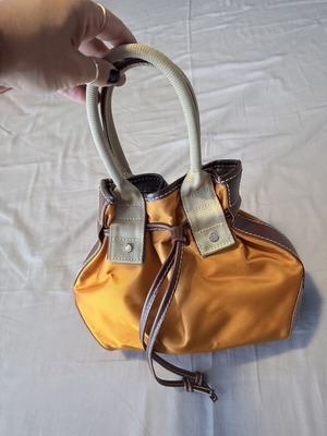 Lancel handbag like new with leather details brown and orange