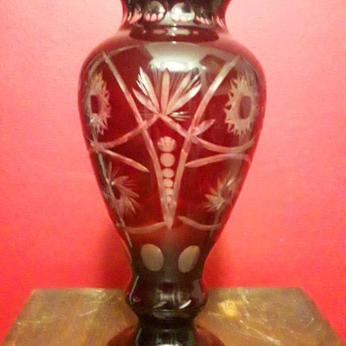 Bohemian heavy crystal vase used, deep red color