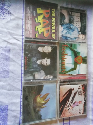 CD discs collection with Audioslave, Muse, The Power Of Rap, Korn, Fashion TV, Alexander
