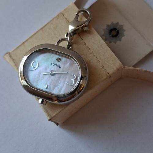 Lorus Quartz watch used, beige and silver, good condition