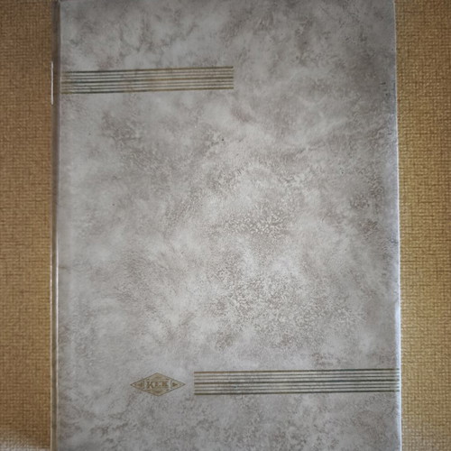 Vintage leather-bound stamp album with German stamps like new